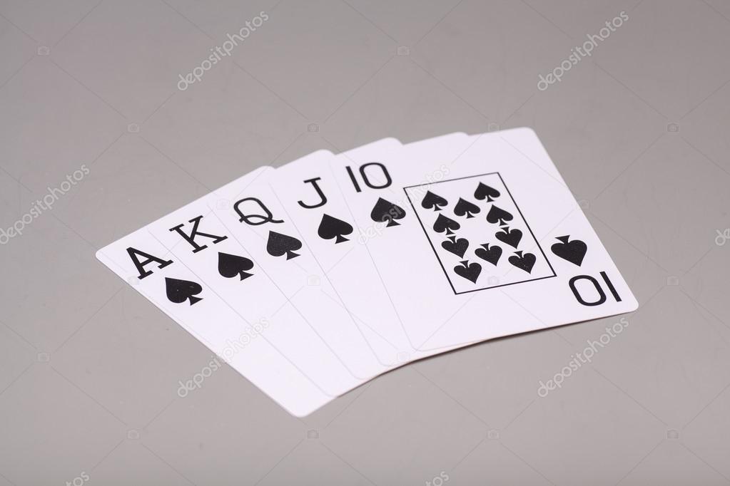 Royal Flush  (playing cards) on gray background
