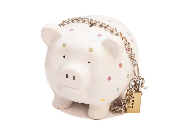 Piggy bank padlocked with chains and padlock on white background — Stock Photo, Image
