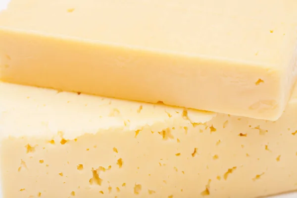 Dos rebanadas de queso fondo — Foto de Stock