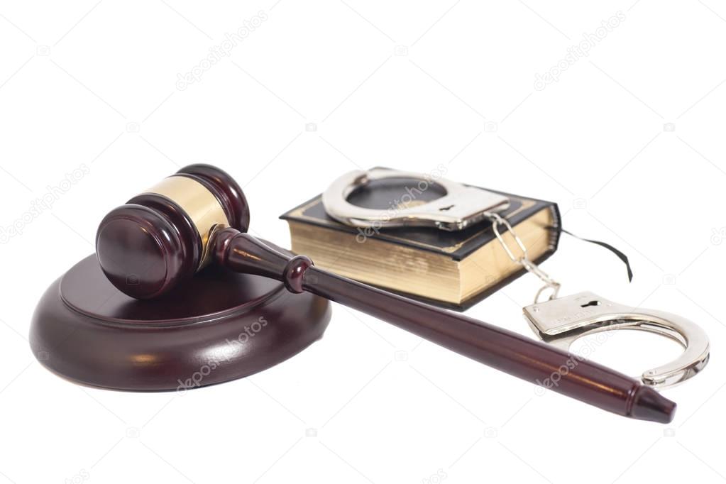 Judge gavel,Handcuffs and book on law