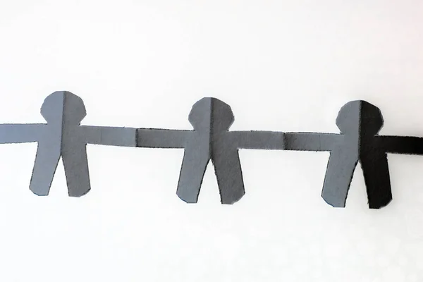 Paper people on white background