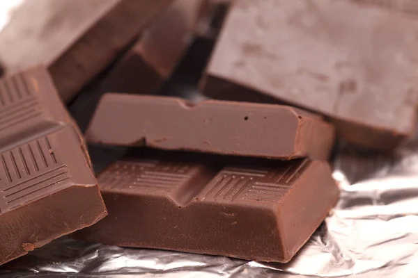 Törött csokoládé csokoládé háttér — Stock Fotó