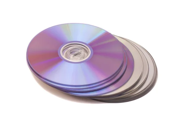 Pilha de cd roms. CD & DVD disco no fundo branco — Fotografia de Stock