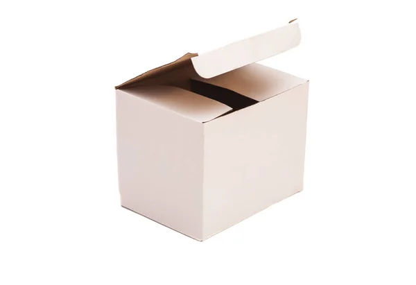 Открыта коробка с белым пакетом — стоковое фото