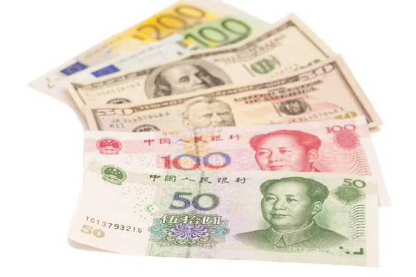 Dólares americanos, euro europeu e notas de yuan chinês — Fotografia de Stock