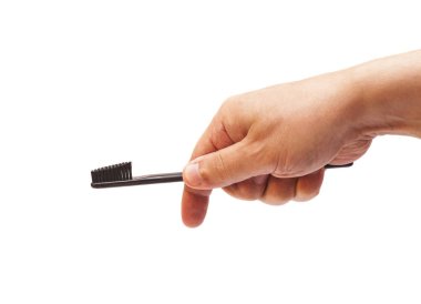 Adam tutarak diş fırçası izole