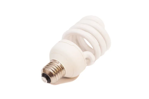 Lâmpada fluorescente de poupança de energia na pastagem branca — Fotografia de Stock