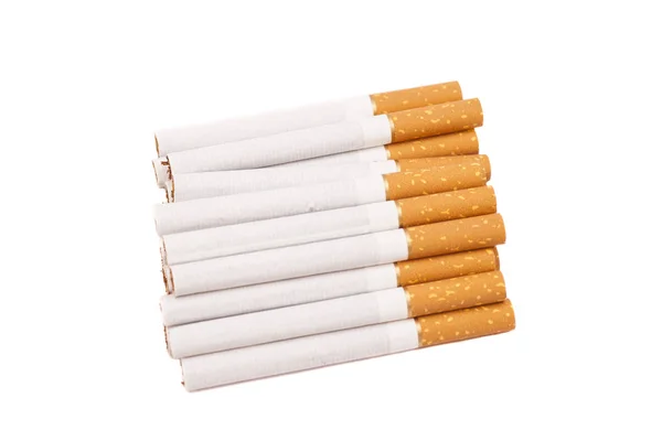 Cigarettes isolées sur le fond blanc — Photo