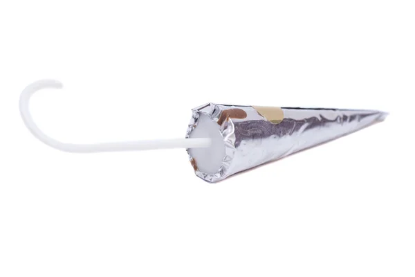 Doces saborosos em um pau isolado no fundo branco — Fotografia de Stock