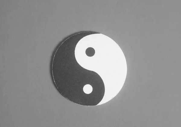 Yin-Yang symbol made of paper on gray background. — Stock Photo, Image