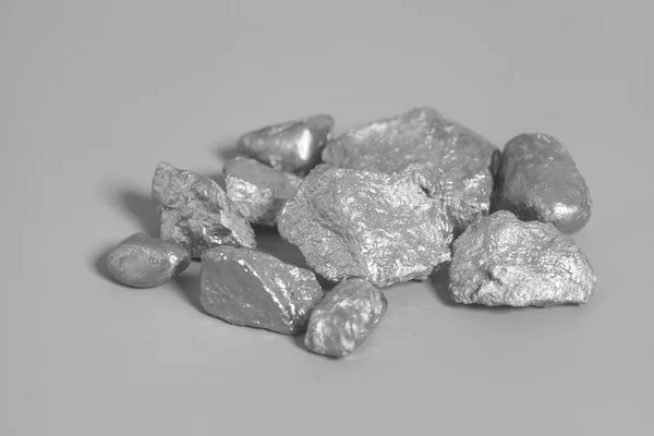 Silver nuggets on gray background — Stock Photo, Image