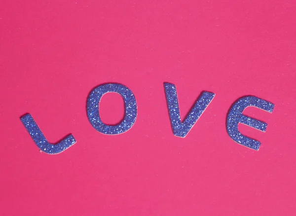 Letras azules brillantes que forman la palabra amor — Foto de Stock