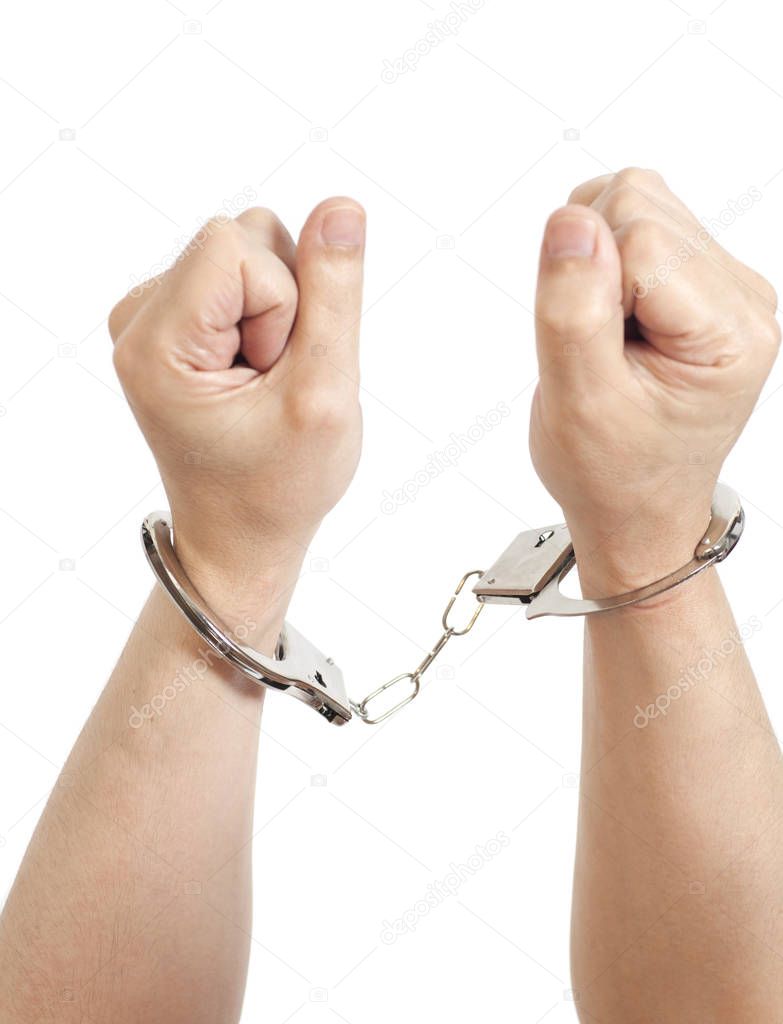 Man hands with handcuffs isolated on white background