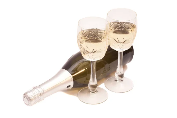 Champagne bottle and champagne glasses — Stock Photo, Image