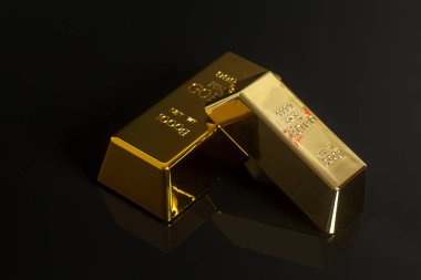 siyah zemin üzerine Altın külçe