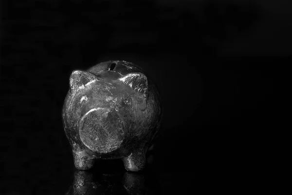 Piggy bank di latar belakang hitam — Stok Foto