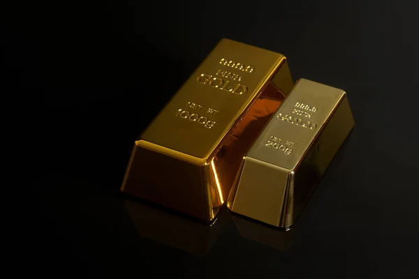 Gold bullion on black background — Stock Photo, Image