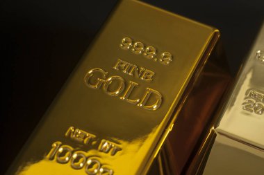 siyah zemin üzerine Altın külçe