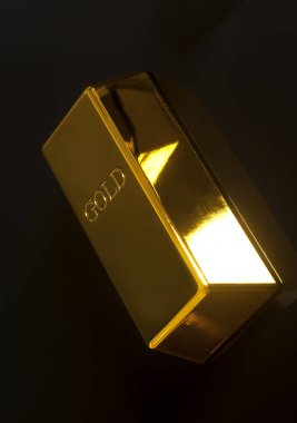 siyah zemin üzerine Altın külçe