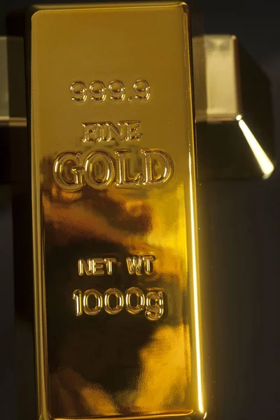 Gold bullion on a black background