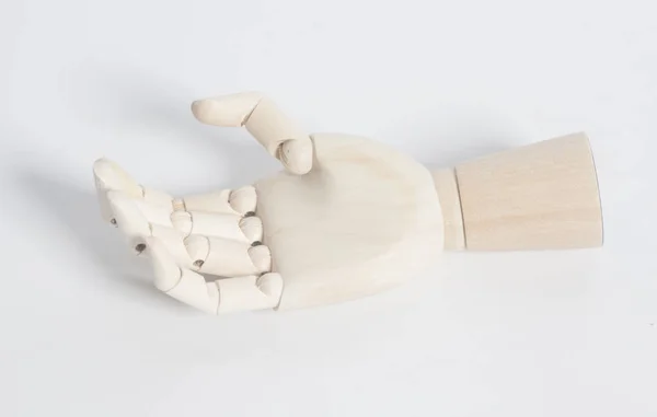 Tangan manusia kayu pada latar belakang putih — Stok Foto