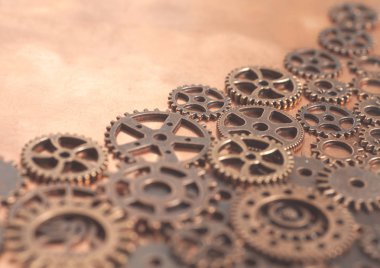 Bakır arka plan üzerinde tekerlekler Metal vites