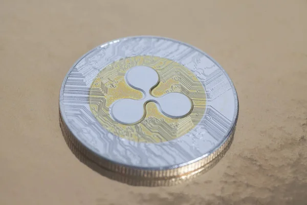 Golden ripple coin — Stock Photo, Image