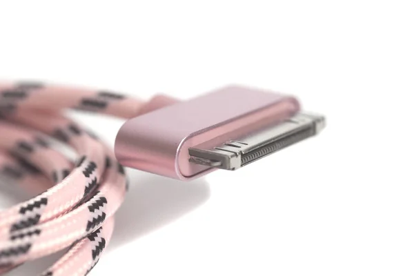 Caricabatterie per dispositivi mobili rosa su sfondo bianco — Foto Stock