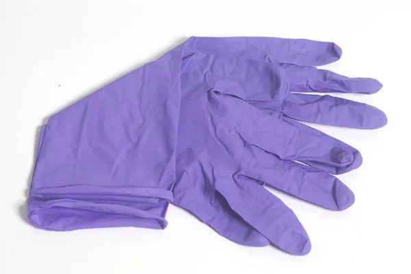 Paarse latex handschoenen — Stockfoto