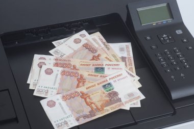 Printer printing Russian rubles bills clipart