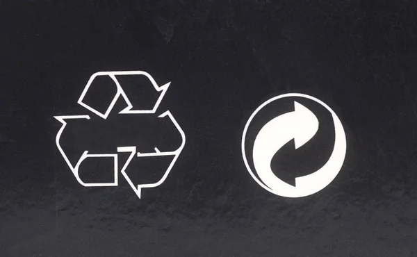 Recycle icon symbol on a black background
