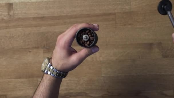 Overhead Rotating Shot of a Male Hands Using a Manuel Gringer — Stock Video
