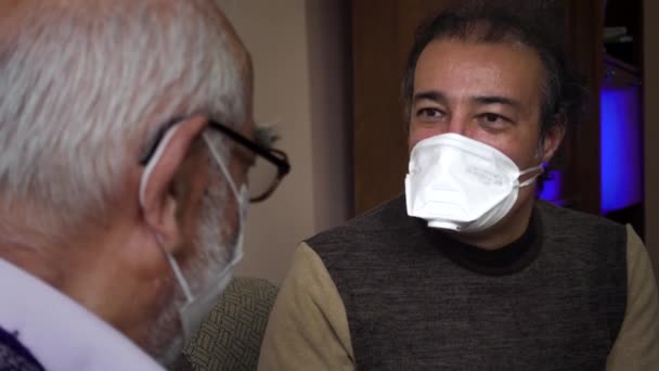 Senior Man Wearing Mask Warns His Father Good — Stock Video