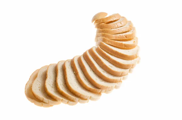 Cut pieces of white bread on a white background — Stock Photo, Image