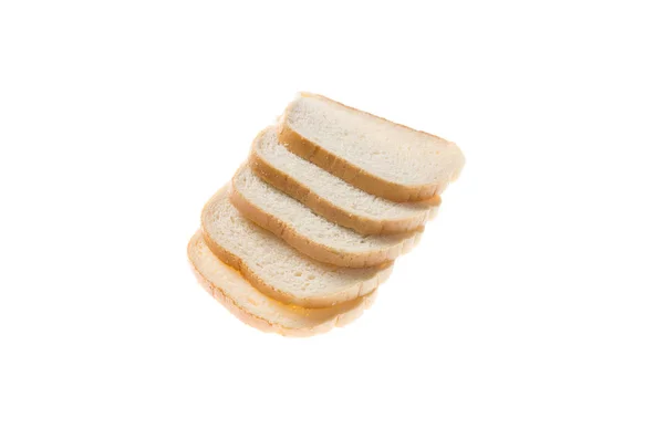 Cut pieces of white bread on a white background — Stock Photo, Image