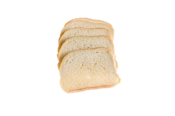 Trozos cortados de pan blanco sobre un fondo blanco —  Fotos de Stock