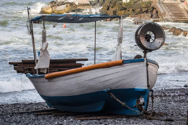 Old ligurian fishing boat called \