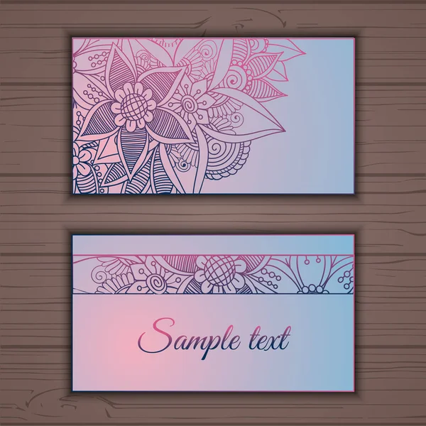 Éléments décoratifs floraux colorés de carte de visite — Image vectorielle