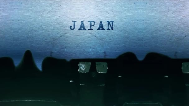 Japão palavras Digitando em uma folha de papel com uma velha máquina de escrever vintage . — Vídeo de Stock