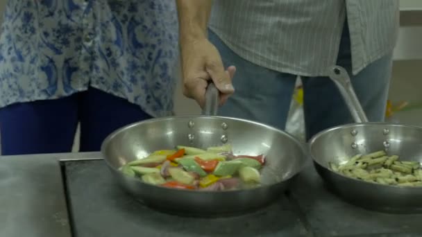 Couple On the Kitchen Cooking Together — Stock Video