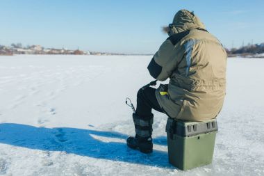 Ice fishing. Winter fishing clipart