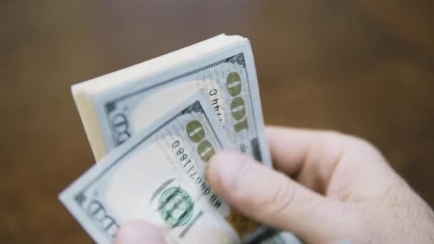 Man counting dollar bills. Close up of male hands count money cash — Stock Video