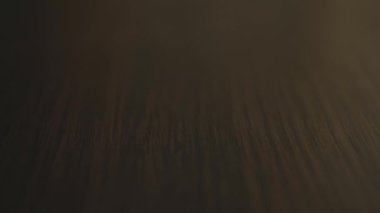 Many white medical pills capsules and drugs fall on table close-up