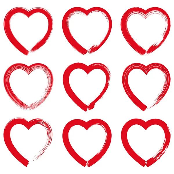 Set of red grunge hand drawn hearts on white background. — ストックベクタ