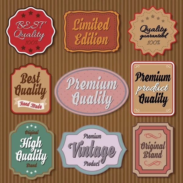 Set of vintage colourful badges on cardboard background — Stock Vector