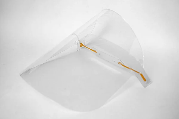 Plexiglass face shield with adjustable mounts, to protect against viruses, covid-19 virus to prevent any objects from getting into your eyes and face, close-up of elements