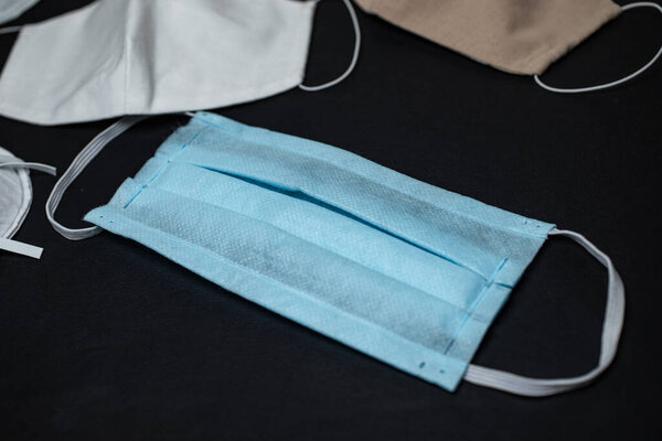 Одноразовая защита от вируса защитной маски лица COVID-19
