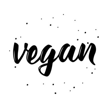 Beyaz arkaplanda siyah el yazısıyla yazılmış bir kelime var. Vegan kaligrafi etiketi.