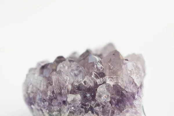 Large amethyst crystal close up photo. Natural stone isolated on light background. — Stock Photo, Image