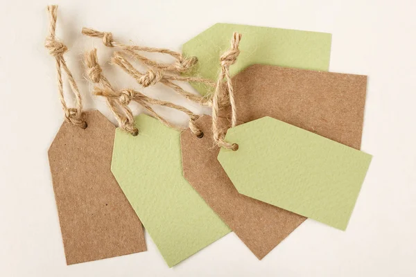 Blank price tags or labels in light green and brown — Stock Photo, Image